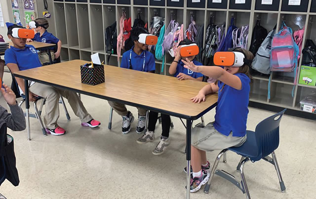 elementary students using ClassVR
